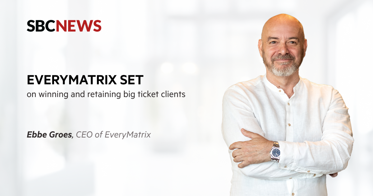 bbe Groes, CEO of EveryMatrix, smiling confidently in a white shirt, featured in an SBC News article discussing client growth and retention strategies.