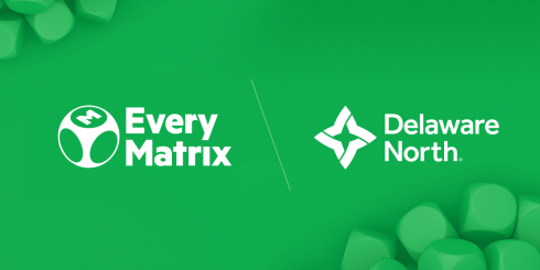 Green background featuring EveryMatrix logo and Delaware North logo, with some visual green cubes in the corners