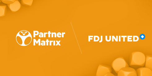 Image in organe background with orange cubes at the corners and PartnerMatrix and FDJ United logo
